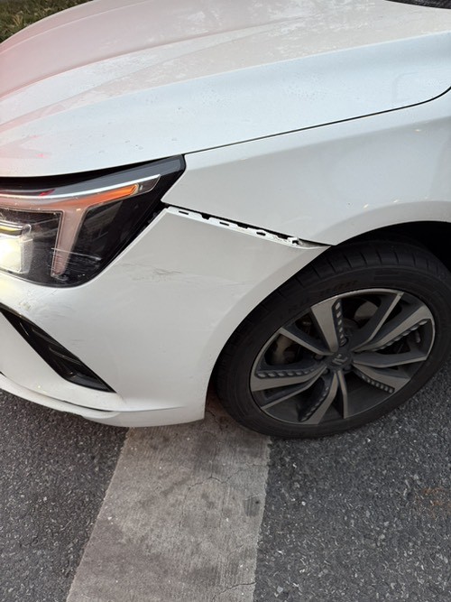 今天开车和别人刮擦了